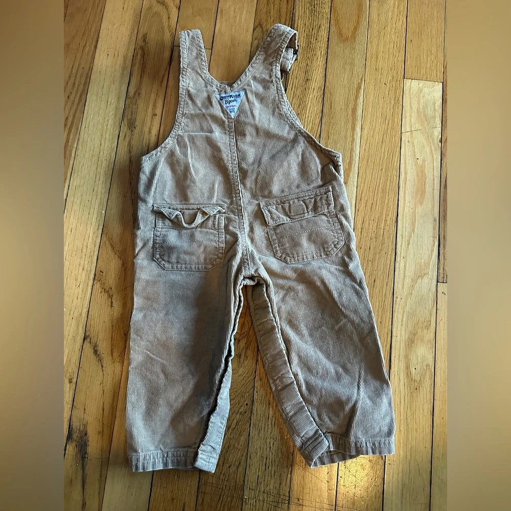 Oshkosh B’gosh Boy’s Size 12M  Tan Overalls w Dinosaurs Embroidery